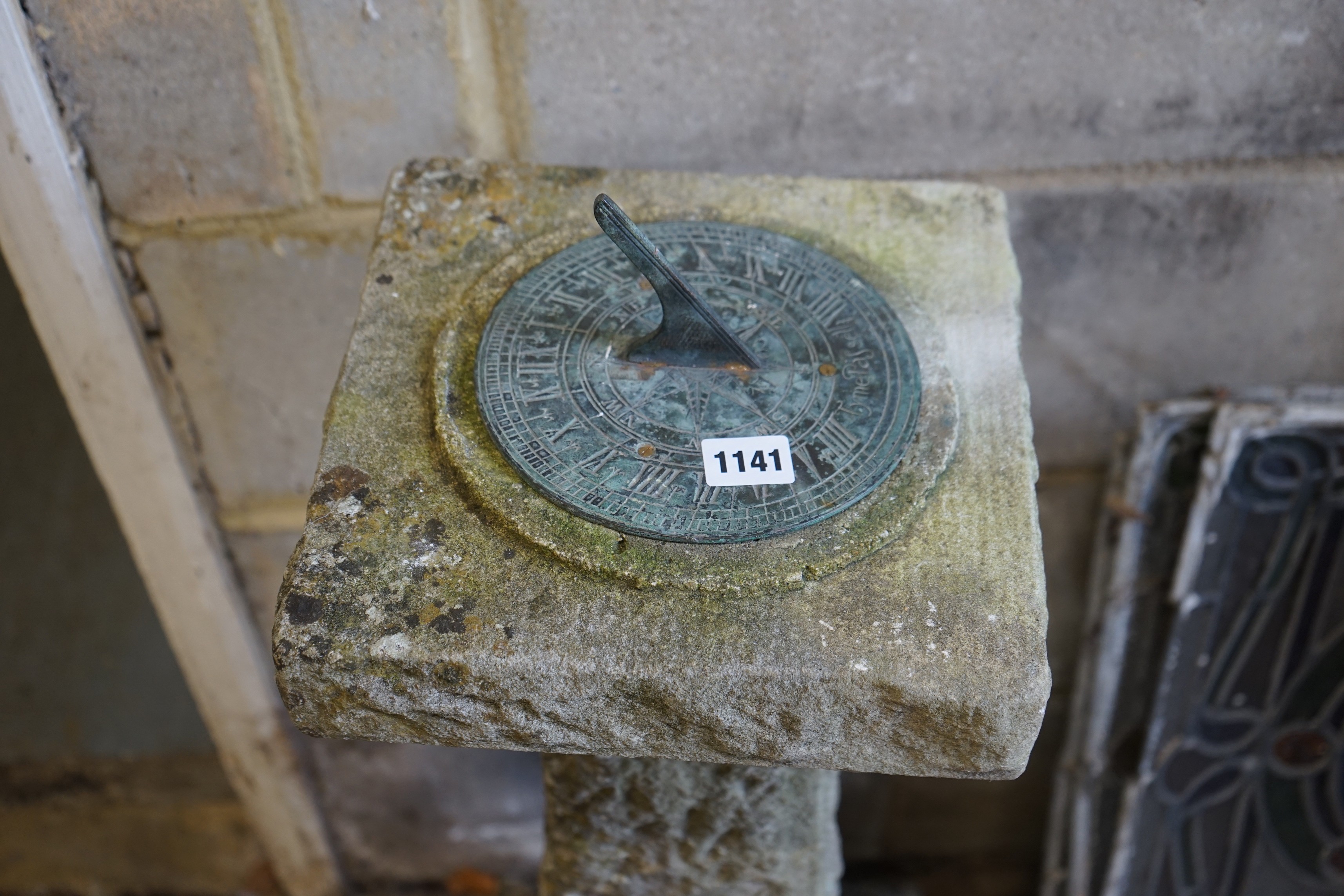 A reconstituted stone garden sun dial, height 88cm